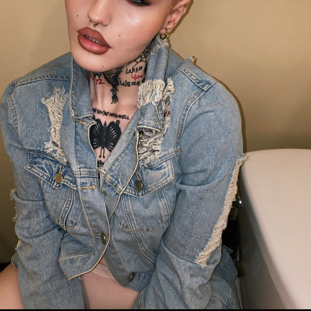 Intentionally ripped Jean jacket